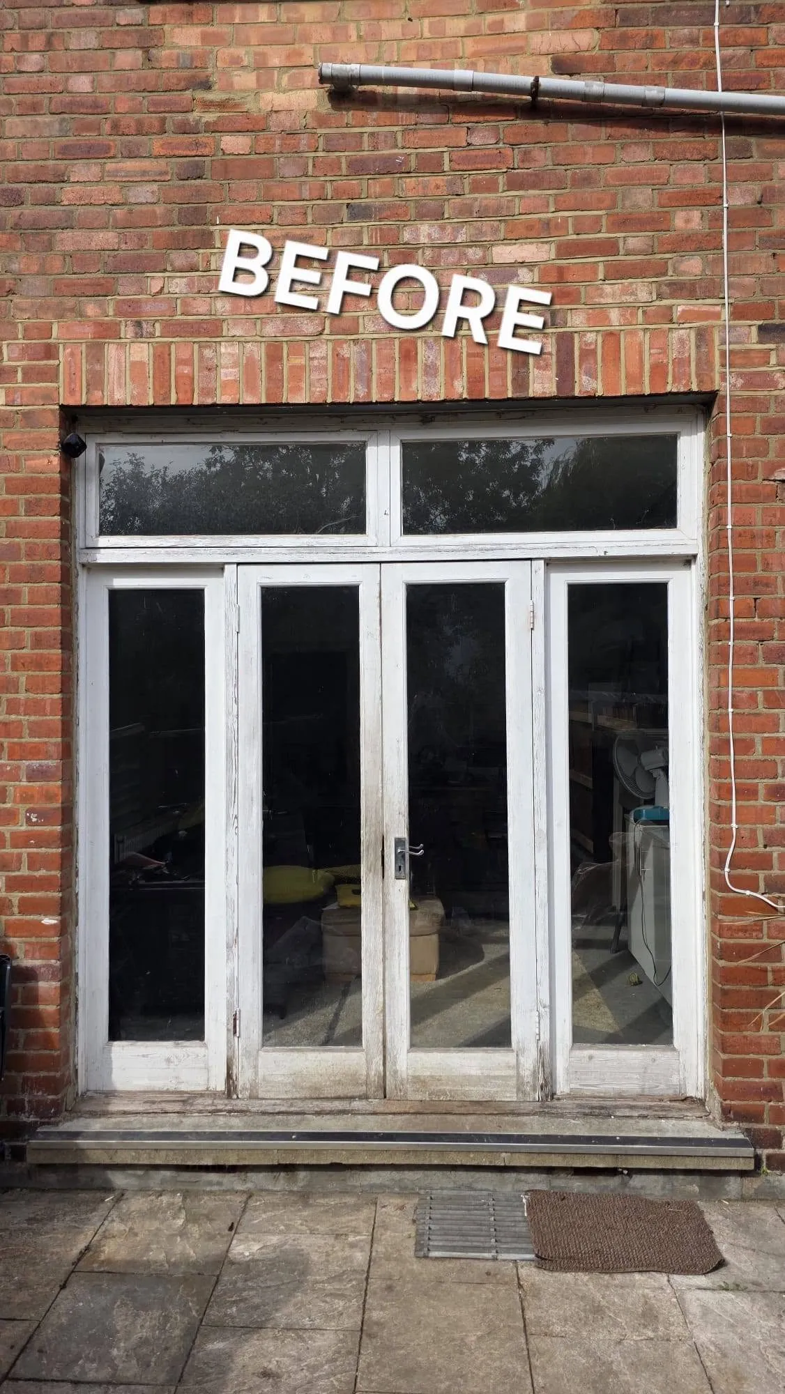 Aluminium — Old, rotted wooden doors that were crying out to be replaced.