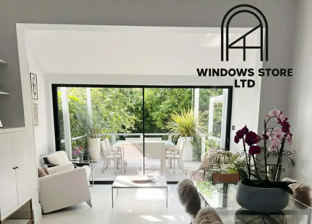 Large aluminium sliding doors with slim frames opening onto a patio