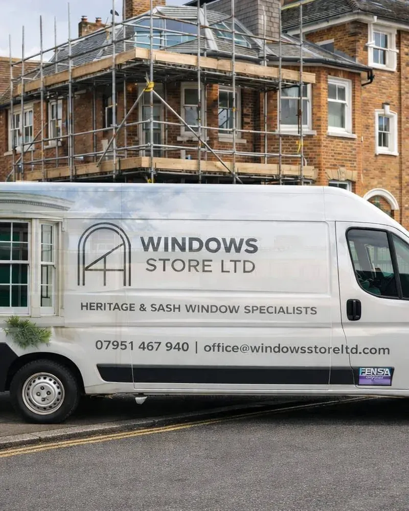 Windows Store Ltd van outside a London period home during a survey