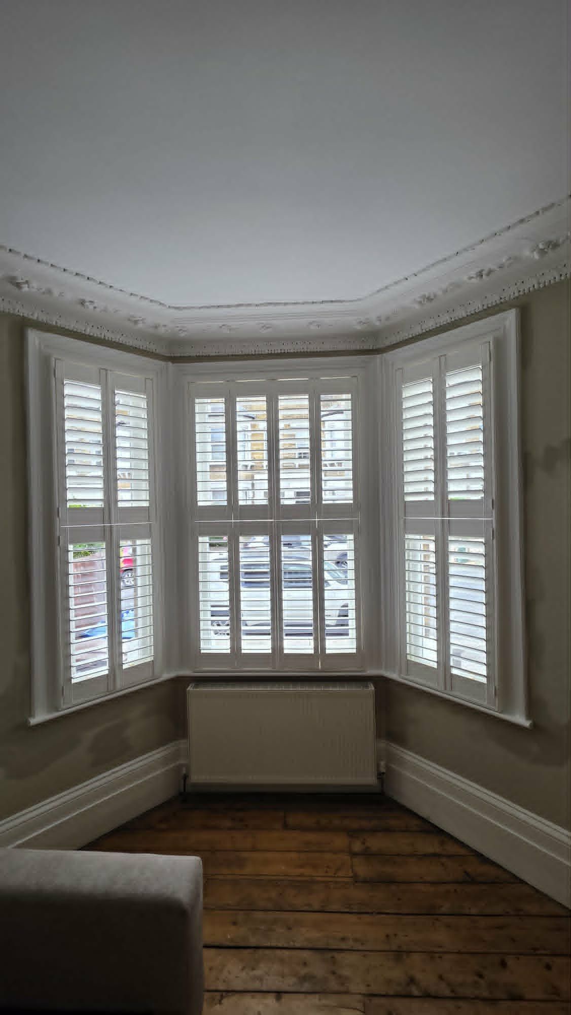 White plantation shutters in a period bay window, St John's Wood NW8
