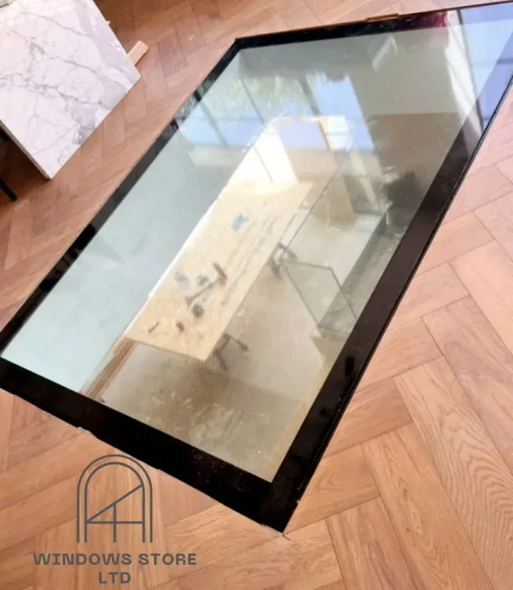 Structural walk-on glass floor panel installed by Windows Store Ltd in a London home